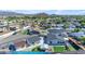 Beautiful aerial view of a residential neighborhood with well-maintained homes and lush green spaces near picturesque mountains at 1840 N Brighton Cir, Mesa, AZ 85207