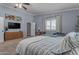 Well-lit bedroom features modern decor, natural light, and a closet at 1840 N Brighton Cir, Mesa, AZ 85207