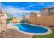 Beautiful backyard pool and lounge area, perfect for outdoor entertaining and relaxation at 1847 E Milky Way, Gilbert, AZ 85295