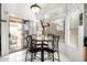 Bright dining area adjacent to the kitchen, flooded with natural light at 1847 E Milky Way, Gilbert, AZ 85295