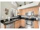 Well-equipped kitchen featuring stainless steel appliances and ample counter space at 1847 E Milky Way, Gilbert, AZ 85295