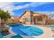 Private backyard pool featuring a lounge area, perfect for enjoying sunny days at 1847 E Milky Way, Gilbert, AZ 85295