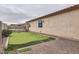 Private putting green, set next to the house with an artificial grass and gravel border at 18625 W Williams Rd, Surprise, AZ 85387