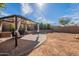 Spacious backyard with a gazebo, patio area, and potential landscaping at 1899 W Prospector Way, San Tan Valley, AZ 85144