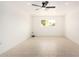 Well-lit bedroom with neutral walls and tile flooring at 19817 N Ponderosa Cir, Sun City, AZ 85373