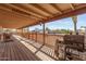 Expansive back porch area with a grill, perfect for outdoor entertaining and enjoying the serene surroundings at 205 E Irvine Rd, Phoenix, AZ 85086