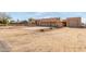 Charming single-story home with a detached garage/workshop and a three-car garage at 205 E Irvine Rd, Phoenix, AZ 85086