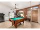 Spacious game room with a pool table and neutral tile flooring at 205 E Irvine Rd, Phoenix, AZ 85086