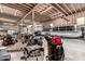 Spacious garage interior with RV, Boat, and various tools; versatile space for storage and hobbies at 205 E Irvine Rd, Phoenix, AZ 85086