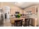 Bright kitchen with light wood cabinets, stainless steel appliances, and butcher block island countertop at 205 E Irvine Rd, Phoenix, AZ 85086