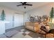 Whimsical Bedroom with custom wall art, a crib, and ample space for play at 2125 W Berridge Ln, Phoenix, AZ 85015