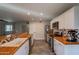 Spacious kitchen with stainless steel appliances, butcher block counters, white cabinets, and tiled floors at 2125 W Berridge Ln, Phoenix, AZ 85015