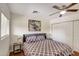 This bedroom features a comfortable bed, modern decor, and a ceiling fan for added comfort at 2217 N 37Th Pl, Phoenix, AZ 85008