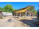 Spacious multi-story house with ground-level garages and shaded upper-level balconies at 2217 N 37Th Pl, Phoenix, AZ 85008