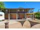 Multi-story house featuring ground-level garages and upper-level balconies at 2217 N 37Th Pl, Phoenix, AZ 85008