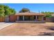 Charming single-story home with a welcoming front porch and a well-maintained yard at 2217 N 37Th Pl, Phoenix, AZ 85008