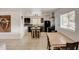 Modern kitchen with black cabinetry, butcher block island, stainless steel appliances, and tile flooring at 2217 N 37Th Pl, Phoenix, AZ 85008