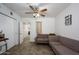 Bright living room with neutral colors and a glimpse into an adjacent hallway at 2217 N 37Th Pl, Phoenix, AZ 85008