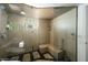 Contemporary shower with stone accents, glass enclosure, and built-in seating at 2217 N 37Th Pl, Phoenix, AZ 85008