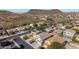 Expansive aerial view of a suburban neighborhood with desert landscape and distant mountains at 23510 N 25Th St, Phoenix, AZ 85024