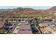 Wide aerial view of a suburban community with backyard pools and scenic mountain views at 23510 N 25Th St, Phoenix, AZ 85024