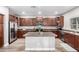 Kitchen featuring stainless steel appliances, hardwood floors, and a large center island at 23510 N 25Th St, Phoenix, AZ 85024