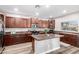 Kitchen featuring hardwood floors, stainless steel appliances, recessed lighting, and a center island at 23510 N 25Th St, Phoenix, AZ 85024