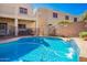 A refreshing pool with a gentle waterfall cascading into the clear, blue water at 23510 N 25Th St, Phoenix, AZ 85024