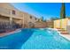 Sparkling pool with waterfall feature, perfect for backyard relaxation and entertainment at 23510 N 25Th St, Phoenix, AZ 85024