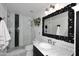 Elegant bathroom with a glass-enclosed shower and a vanity with a marble countertop at 24024 N 74Th St, Scottsdale, AZ 85255