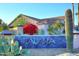 Entrance sign to Talara community surrounded by desert landscape with cacti and flowering bushes at 24024 N 74Th St, Scottsdale, AZ 85255