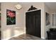 Grand entryway featuring an ornate chandelier and decorative double doors, creating a luxurious first impression at 24024 N 74Th St, Scottsdale, AZ 85255