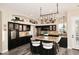 Stylish kitchen featuring stainless steel appliances, granite counters, and an island with bar seating at 24024 N 74Th St, Scottsdale, AZ 85255