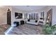 Stylish living room with plantation shutters, neutral walls, and modern furniture at 24024 N 74Th St, Scottsdale, AZ 85255