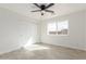 Bedroom featuring a large window and closet with modern flooring at 28214 N 223Rd Ln, Wittmann, AZ 85361