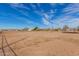 A vast expanse of land showcasing its potential for development, recreation, or agricultural use at 28214 N 223Rd Ln, Wittmann, AZ 85361