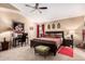 Spacious main bedroom featuring a ceiling fan, neutral walls, and comfortable carpeting at 29247 N Bauxite Ln, San Tan Valley, AZ 85143