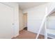 Bedroom featuring ladder bed, closet and doorway at 3043 W Melinda Ln, Phoenix, AZ 85027