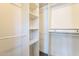 Spacious walk-in closet with shelving and rack at 3043 W Melinda Ln, Phoenix, AZ 85027