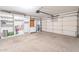 Attached garage with custom built-in shelving and storage cabinets at 3043 W Melinda Ln, Phoenix, AZ 85027