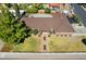 Aerial view of a well-maintained single Gathering home with a manicured front lawn at 3160 E Fox St, Mesa, AZ 85213