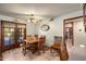 Cozy dining room featuring a wood table, chairs and a door to the backyard at 3160 E Fox St, Mesa, AZ 85213