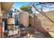 Backyard utility area with necessary tanks and equipment, discreetly located for functionality and convenience at 3160 E Fox St, Mesa, AZ 85213