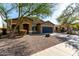 Charming single-story home featuring a well-maintained landscape and a two-car garage at 3233 N 137Th Dr, Avondale, AZ 85392