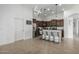 Modern kitchen with stainless steel appliances, a breakfast bar, and pendant lighting at 3233 N 137Th Dr, Avondale, AZ 85392