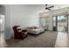 Bright living room with ample natural light, featuring stylish seating and neutral tones at 3233 N 137Th Dr, Avondale, AZ 85392