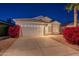 Charming single-story home featuring a well-manicured yard with vibrant bougainvillea at 3522 E Edna Ave, Phoenix, AZ 85032