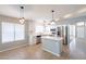 Updated kitchen featuring white cabinetry, tile backsplash, and stainless steel appliances at 3522 E Edna Ave, Phoenix, AZ 85032