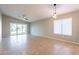 Spacious living room features tiled floors, natural light, and a sliding glass door at 3522 E Edna Ave, Phoenix, AZ 85032