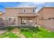 Backyard featuring green grass, exterior elevation with covered patio and sliding glass doors with seating at 3532 E Alfalfa Dr, Gilbert, AZ 85298